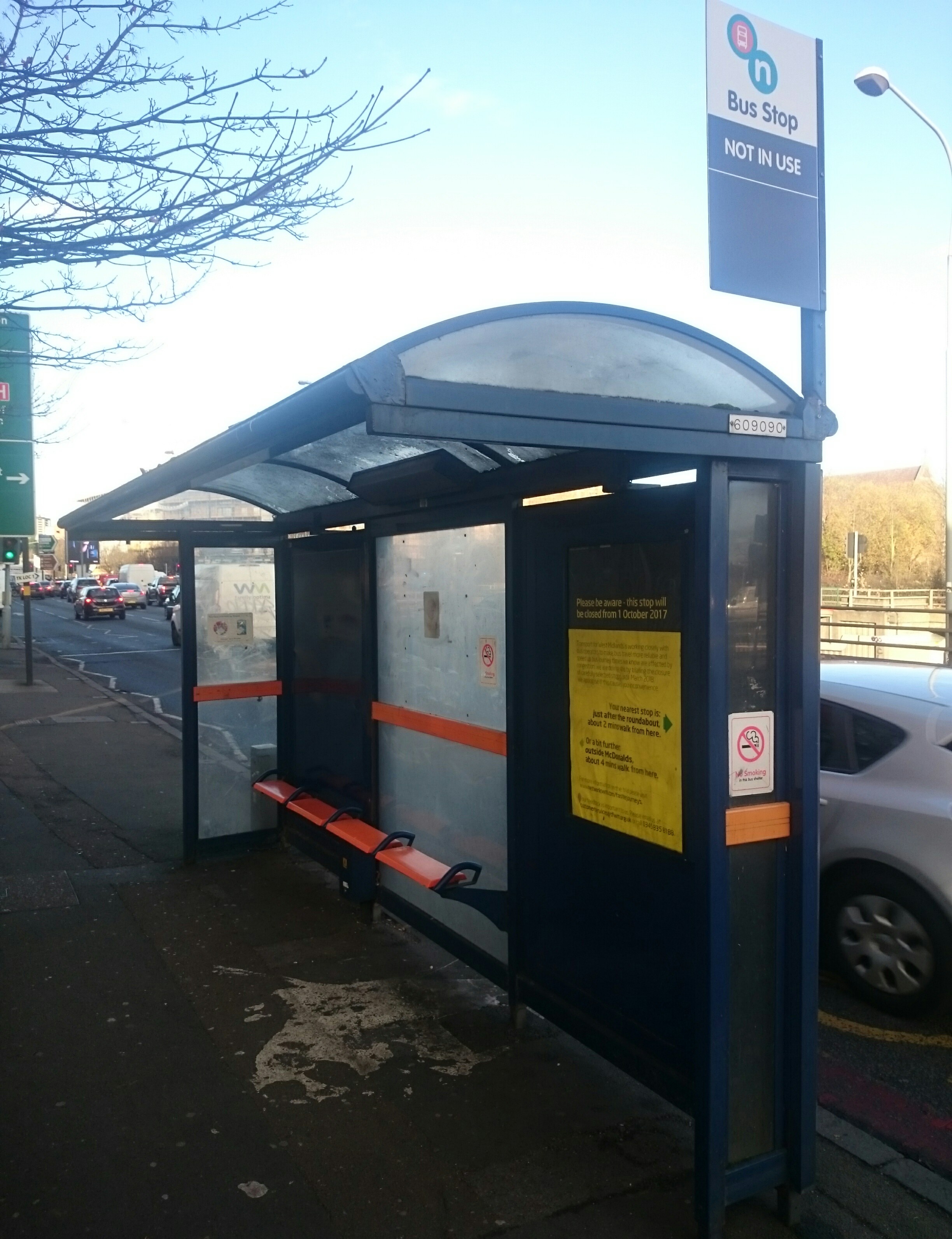 How to report issues with bus stops or shelters